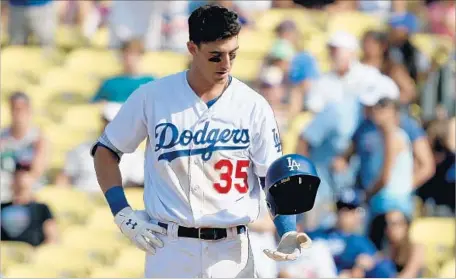  ?? Luis Sinco Los Angeles Times ?? THE HITTING WOES continued on Sunday for Cody Bellinger, who went 0 for 3 with two strikeouts, and for the Dodgers, who scored only 13 runs while going 0-7 on a homestand against Arizona and Colorado. The team has lost 10 in a row and 15 of its last 16...