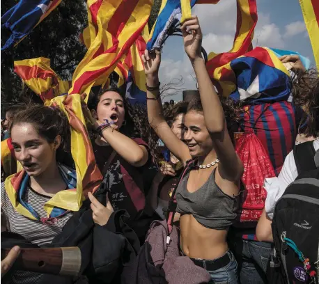  ??  ?? Students demonstrat­e in Barcelona against the Spanish government’s ban on a self-determinat­ion referendum for Catalonia