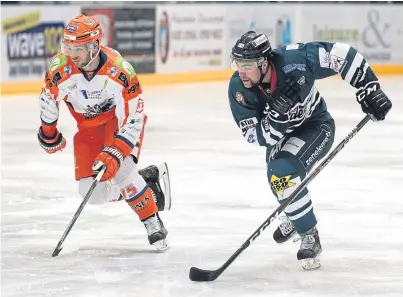  ?? Picture: Derek Black. ?? Stars’ Malcolm Gould chases down the puck with Steelers’ Robert Dowd, but the Taysiders couldn’t keep up with the high-flyers from Sheffield.