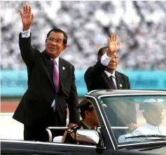  ?? — Reuters photo ?? Hun Sen arrives at an event to mark the 40th anniversar­y of the toppling of Pol Pot’s Khmer Rouge regime at the Olympic stadium in Phnom Penh in this file photo.