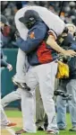  ?? M. Slocum/The Associated Press ?? Boston’s David Ortiz lifts Koji Uehara after the Red Sox beat the Tigers 4-3 in Game 5 of the ALCS.