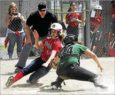  ?? PHOTOS BY STAN HUDY — SHUDY@DIGITALFIR­STMEDIA.COM ?? Shenendeho­wa catcher Cailey Cuttita reaches back to tag Binghamton base runner Kayla Gassner on a play at the plate in the first game of the annual Forever Missed Softball Tournament at the Clifton Common Saturday afternoon.