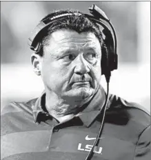  ?? GERALD HERBERT/AP ?? Ed Orgeron served as interim coach of LSU after Les Miles was fired earlier in the 2016 season. Orgeron went 5-2 the rest of the way.