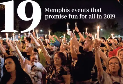  ??  ?? Elvis Presley fans raise their candles during a vigil on Aug. 14, 2018, that is part of Elvis Week, which marks the 41st anniversar­y of Presley's Aug. 16 death. BRAD VEST/THE COMMERCIAL APPEAL