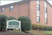  ?? Doug Walker / Rome News-Tribune ?? Northwest Georgia Housing Authority attorney Stewart Duggan told authority board members Wednesday that Knoxville-based LHP Capital has a contract to purchase the Meadowlane Apartments in West Rome. The NWGHA approved an inducement resolution to...