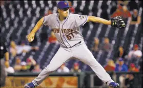  ??  ?? Bill Streicher USA Today New York Mets reliever Paul Sewald, a Bishop Gorman High product, throws a scoreless ninth inning against the Phillies on Tuesday at Citizens Bank Park in Philadelph­ia.