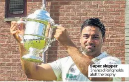 ??  ?? Super skipper Shahzad Rafiq holds aloft the trophy