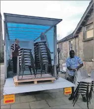  ??  ?? Bill Nelson and Lamin Bajo load up the van at Inveraray Community Hall.