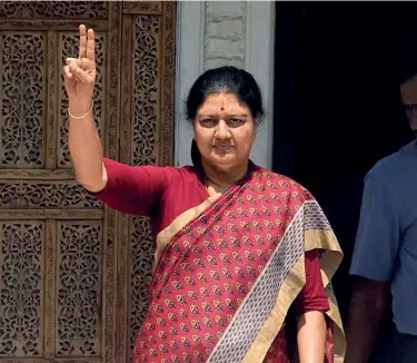  ??  ?? SECOND COMING? Sasikala, then the AIADMK general secretary, greets a waiting crowd after a special meeting of the party MLAs, at the party HQ in Chennai, February 8, 2017. A week later, she surrendere­d and went to jail