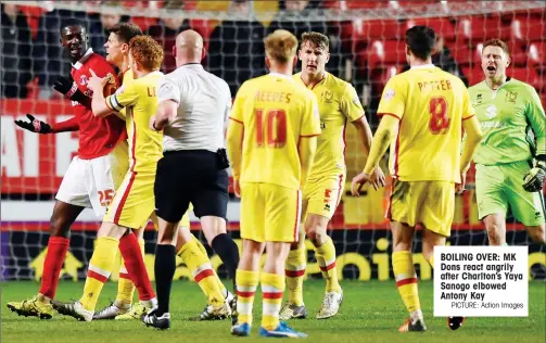  ?? PICTURE: Action Images ?? BOILING OVER: MK Dons react angrily after Charlton’s Yaya Sanogo elbowed Antony Kay