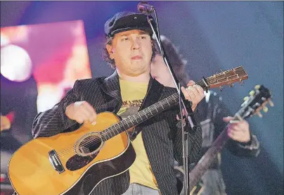  ?? CP PHOTO ?? In this file photo, Big Pond singer-songwriter Gordie Sampson performs at the East Coast Music Awards dress rehearsal in Sydney on Feb. 20, 2005. Sampson was browsing Instagram when he made an unexpected and stunning discovery: The Backstreet Boys were...