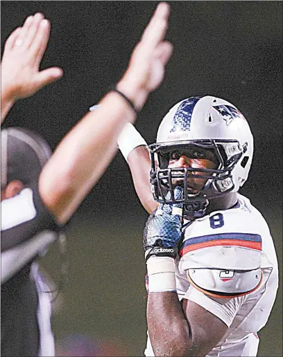  ?? CALIFORNIA­N FILE ?? Krys Barnes celebrates a turnover in a 2015 game with Liberty. The former star linebacker had bigger things to celebrate Saturday, signing a free agent contract with the Green Bay Packers.