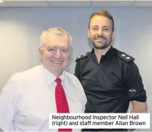  ??  ?? Neighbourh­ood Inspector Neil Hall (right) and staff member Allan Brown