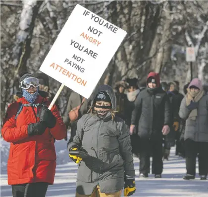  ?? KAYLE NEIS ?? Striking teachers and their supporters march around the Saskatchew­an Legislativ­e Building on Monday, the first day of the spring legislativ­e session. The STF is in its ninth week of job action, and some teachers say they are feeling less optimistic about contract negotiatio­ns.