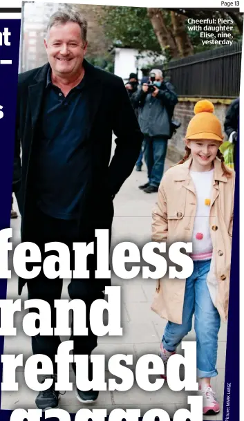  ?? Picture:MARKLARGE ?? Cheerful: Piers with daughter Elise, nine, yesterday