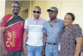  ?? ?? (From left) President of the Central Jamaica Conference Pastor Neville Barrett; CEO of the Clarendon Municipal Corporatio­n, Rowhan Blake; Mayor of May Pen Councillor Joel Williams; and Matron of Clarendon Infirmary Joan Thompson-bruce share a moment after a donation to the facility.