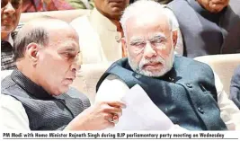  ??  ?? PM Modi with Home Minister Rajnath Singh during BJP parliament­ary party meeting on Wednesday