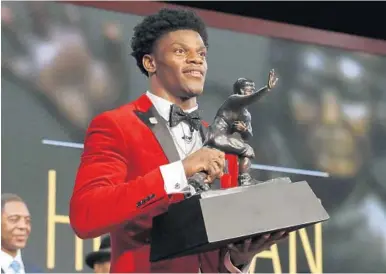  ?? AP/FILE ?? Louisville quarterbac­k and Broward County native Lamar Jackson, taken by Baltimore, was the draft’s most fascinatin­g talent.