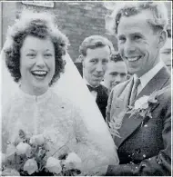  ??  ?? Mary and Ken are all smiles on their wedding day