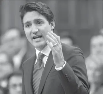 ?? ADRIAN WYLD/THE CANADIAN PRESS ?? Prime Minister Justin Trudeau says Canada can and must do more for Syrian refugees.