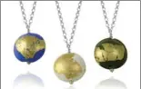  ??  ?? Hand blown glass bead pendants with 14-karat gold leaf, by Hamilton designer and goldsmith Kathryn Dieroff.