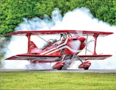  ?? SUBMITTED PHOTO ?? This biplane will be one of many performing aerial stunts at the Festival of Flight in New Garden this weekend.