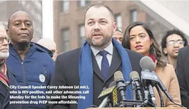  ??  ?? City Council Speaker Corey Johnson (at mic), who is HIV-positive, and other advocates call Monday for the feds to make the lifesaving prevention drug PrEP more affordable. JOHN MCCARTEN