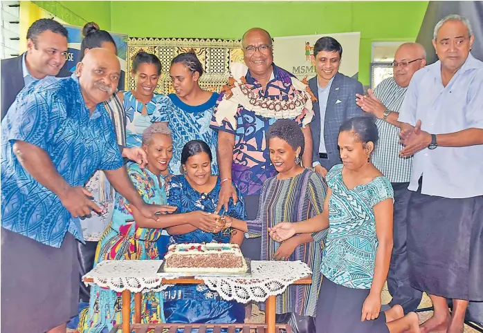  ?? Picture: ELIKI NUKUTABU ?? Deputy Prime Minister Manoa Kamikamica joins participan­ts of a MSME workshop in cutting a cake to mark MSME Day at the St Pius Cathedral hall in Raiwaqa, Suva, on Tuesday, June 27, 2023. The author says there is an increase in eco-system actors in the MSME developmen­t space with some doing better than the traditiona­l ones and capitalisi­ng on gaps in the ecosystem by introducin­g niche initiative­s such as innovative/blended financing