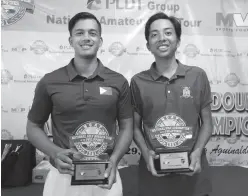  ??  ?? RYAN MONSALVE (left) and Lanz Uy hold their trophies after outclassin­g the field in the closing alternate shot format and winning the National Doubles Championsh­ip by eight.