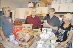  ?? SHARON MONTGOMERY-DUPE/CAPE BRETON POST ?? Dave Sawler, from left, executive director of the Undercurre­nt Youth Centre, Ed Beaton, executive director of Town House, Dave MacKeigan, chair of the Glace Bay Food Bank Society and Sandra MacPherson, a food bank co-ordinator, are planning a summer...