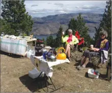  ?? Submitted photo ?? Last year’s inaugural Tea at the Top event was so successful that The Trail of the Okanagans Society is holding another on May 28. About 100 people — 50 walkers from the Peachland end and 50 cyclists from the Summerland end — raised more than $300 in...