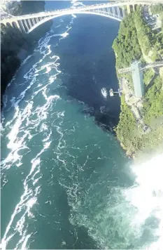  ?? ASSOCIATED PRESS ?? In this July 29 photo, black-coloured wastewater treatment discharge is released into the Niagara River.