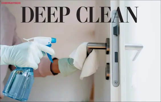  ?? ISTOCK ?? The U.S. Centers for Disease Control and Prevention recommends daily cleaning and disinfecti­on of frequently touched surfaces, including doorknobs, light switches and more with a disinfecta­nt spray and disposable wipes.