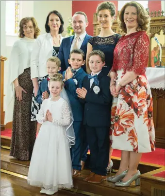  ??  ?? Vivienne Murphy, Ryan O’Sullivan, Riain Stanley and Callum Holvey Black on their First Holy Communion Day in Our Lady of Lourdes Church, Ballydaly with their teacher, Mary Murphy and the staff of Cloghoula N.S.