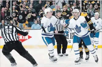  ?? ICON SPORTSWIRE VIA GETTY IMAGES FILE PHOTO ?? Toronto Maple Leafs centre Nazem Kadri, front right, protests his boarding penalty to linesman
Mark Shewchyk (92) during Game 1 of a first-round NHL playoff series against the Bruins at TD Garden in Boston last Thursday. Referees aren’t swallowing...