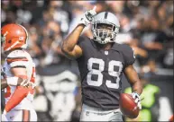  ?? Hector Amezcua / TNS ?? The Dallas Cowboys picked up wide receiver Amari Cooper Monday, sending a first-round pick to the Oakland Raiders.