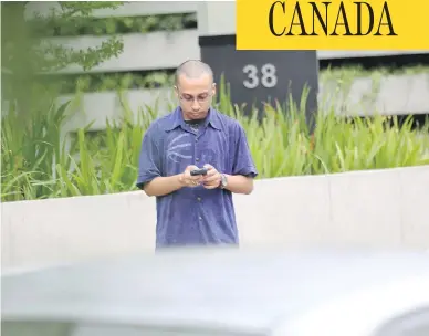  ?? PRINCE MAHMOOD FOR POSTMEDIA NEWS ?? Salman Hossain, a Toronto man wanted for inciting genocide against Jews, is seen outside a coffee shop in Dhaka, Bangladesh on Sunday. Hossain’s online presence offers hints about his whereabout­s yet he has not been arrested.