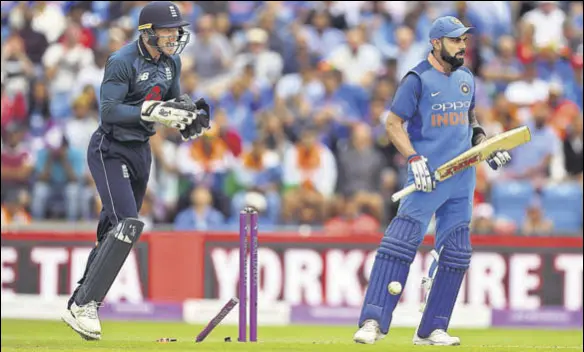  ?? GETTY IMAGES ?? Virat Kohli was bowled by a classic legbreak from Adil Rashid. The skipper made 71 off 72 deliveries and his dismissal put the brakes on India’s progress.