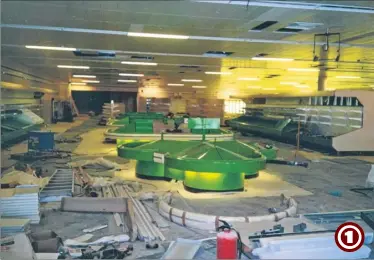  ??  ?? Sainsbury’s Bybrook, 1992, and a rare view showing the general fit-out of the new store, the first time the chain had ventured out of the town centre. Here, the fruit and vegetable area can be seen being assembled, with the fish counter in the...