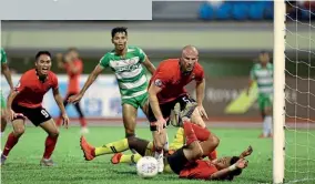  ??  ?? Charlie Clough…the former Forest Green Rovers defender starred for DPMM in the 2019 title win