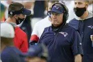  ?? CHRIS O’MEARA — THE ASSOCIATED PRESS ?? New England Patriots head coach Bill Belichick stands on the sidelines during the second half against the Miami Dolphins, Sunday, in Miami Gardens, Fla. The Patriots were eliminated from playoff contention with a 22-12 loss.