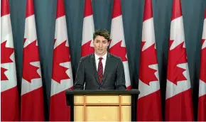  ?? AP ?? Canadian Prime Minister Justin Trudeau says he does not want to escalate frictions with China.