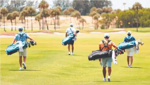  ??  ?? SOCIAL DISTANCING: Pictured from left are Rory McIlroy, Dustin Johnson, Rickie Fowler and Matthew Wolff.
Pictures: GETTY IMAGES