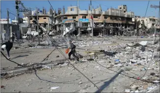  ?? ADEL HANA/ASSOCIATED PRESS ?? Bombardmen­t from Israeli forces caused this destructio­n of an area in the Gaza Strip recently.
