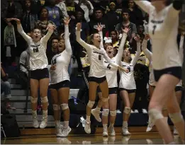  ?? PHOTOS BY D. ROSS CAMERON — SPECIAL TO THE MARIN INDEPENDEN­T JOURNAL ?? Marin Catholic’s bench gets excited about a point for their side during the second set of a NorCal Open Division girls championsh­ip against Bishop O’Dowd in Kentfield on Tuesday.