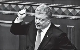  ?? EFREM LUKATSKY/AP ?? Ukrainian President Petro Poroshenko persuaded Parliament to impose martial law.