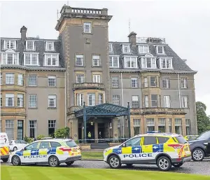  ?? Picture: Steven Brown. ?? Police at Gleneagles Hotel last June. Two men have denied charges of robbery at the five-star resort.