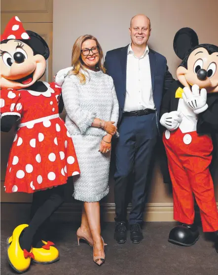  ??  ?? Minnie Mouse, Walt Disney Company Australia CEO Kylie Watson-Wheeler, David Jones CEO David Thomas, and Mickey Mouse.