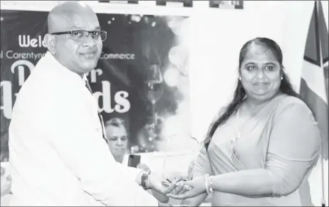  ??  ?? Bibi Azeez (right) receiving her award