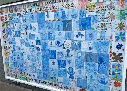  ?? ?? The mural created by children at Twerton Primary and St Michael’s Junior schools has been placed on the wall of the former Co-op in Twerton High Street as part of a drive to brighten up the neighbourh­ood